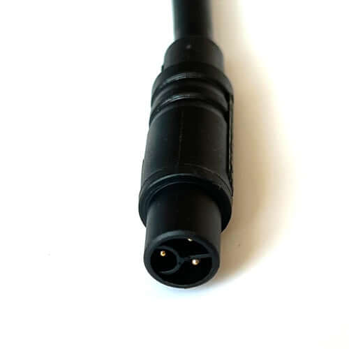 Close-up of a 3-Pin ST3 Ebike charger plug for 48V charging, featuring a sturdy black connector.